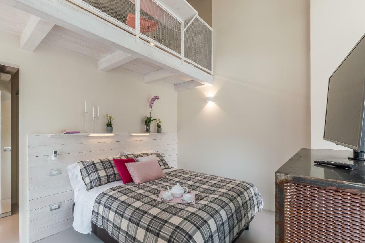 L'Alberocasa Aparthotel กาเลนซาโน ภายนอก รูปภาพ